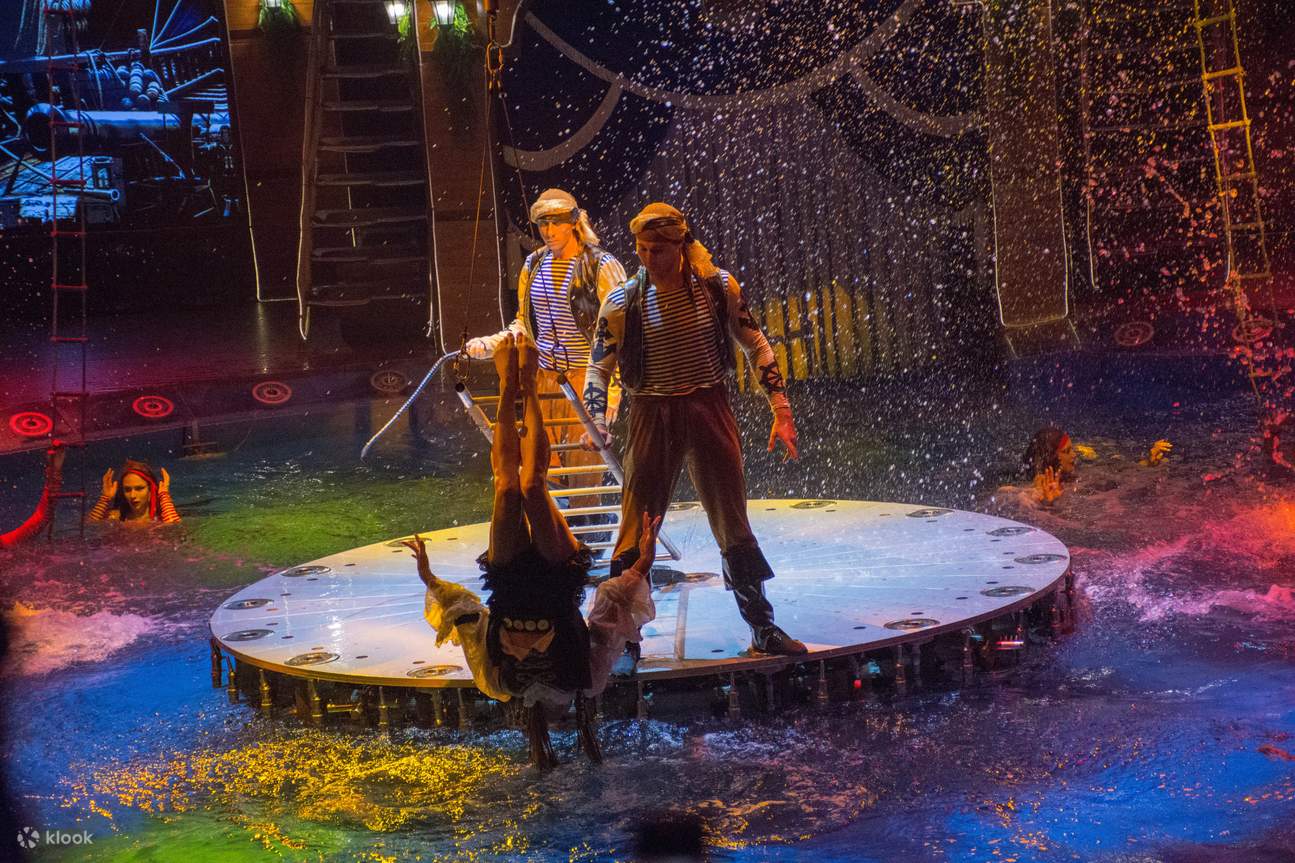 Pirates and splashes everywhere! A thrilling water stunt unfolds as performers bring the stage to life with action and fun!